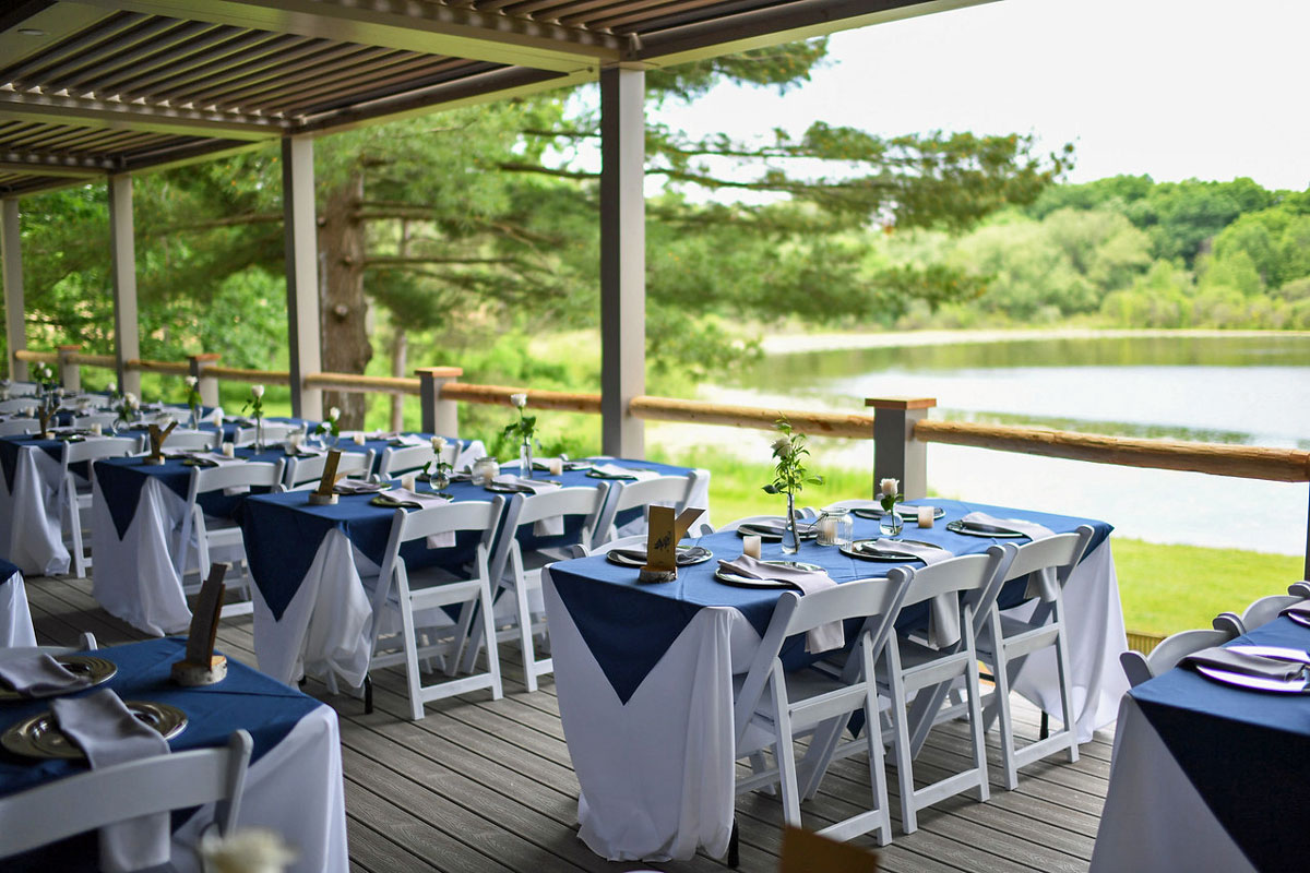 Outdoor wedding tables on the lodge deck